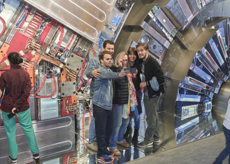 A souvenir-selfie in front of the CMS model in Microcosm before leaving Researchers' Night at CERN