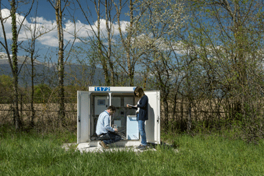 Members of the CERN environment team verifying a radiation monitoring station.