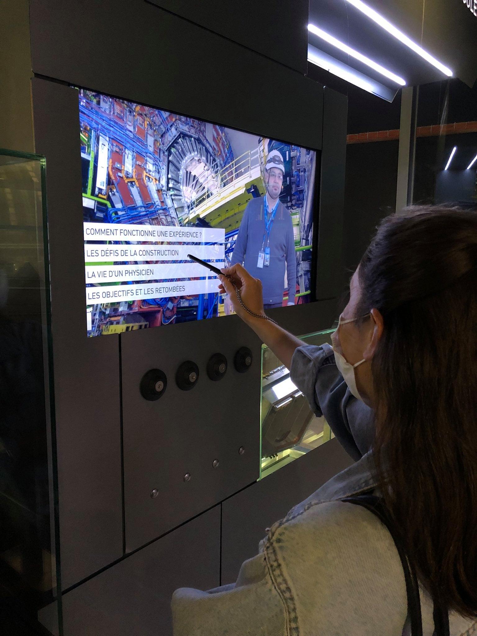 Visitors discover the Microcosm exhibition, under strict sanitary measures