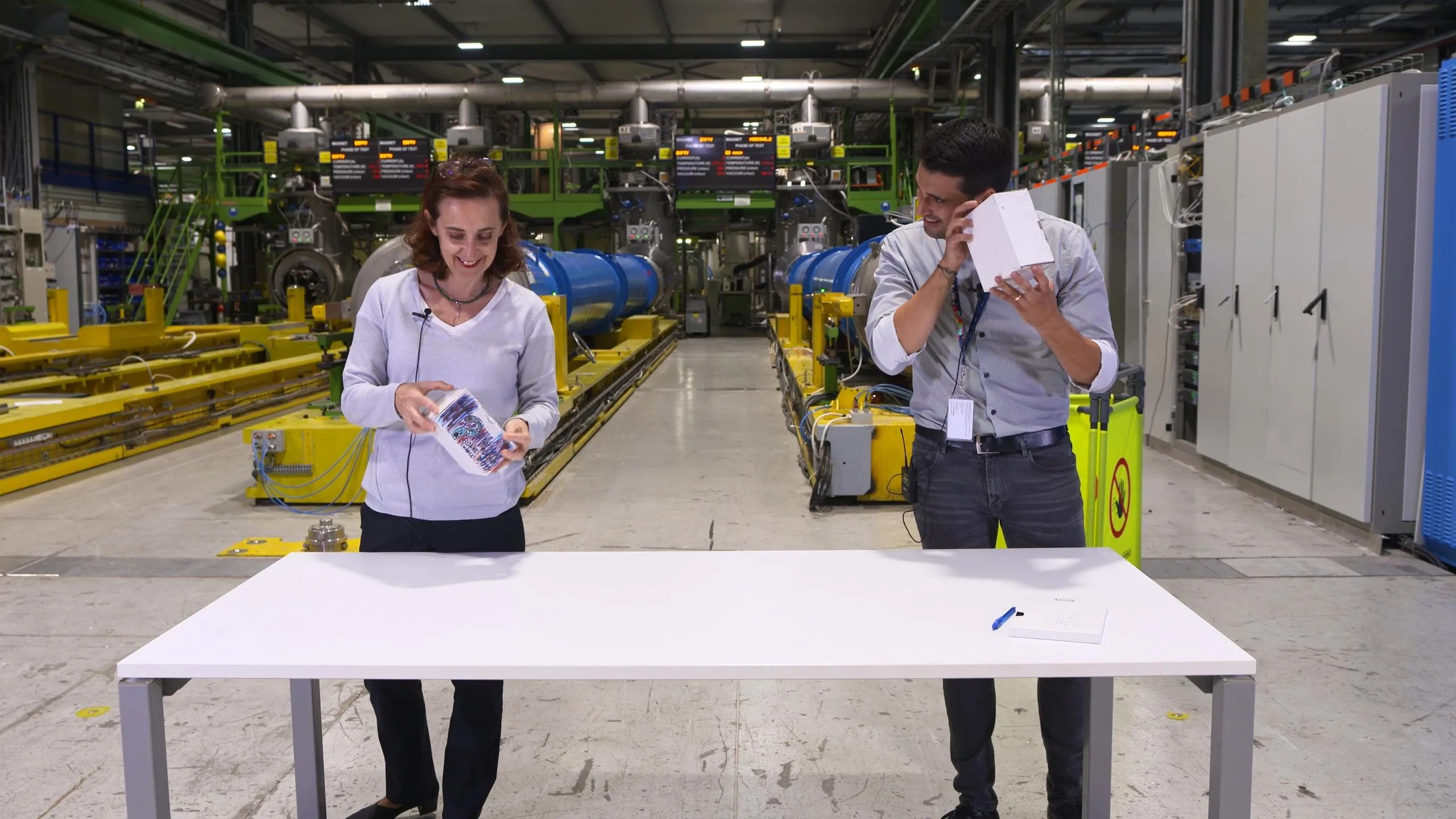 Another team of two CERN scientists try to unlock the secret of the boxes provided by the primary schools